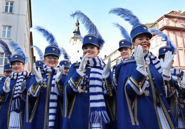 11 November 2025, Bavaria, Wuerzburg: Members of the Prinzengarde parade through the city center at the opening of the carnival season. Photo: Karl-Josef Hildenbrand/dpa