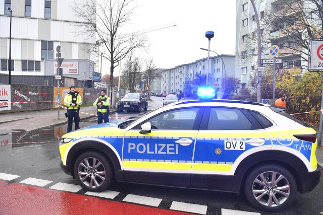 11 November 2025, Berlin: A police vehicle is parked in Berlin-Buckow in the Neukoeln district at the entrance to the local hospital. According to media reports, the windows and façade of the Neukoelln hospital were also damaged in an explosion during the night. Photo: Paul Zinken/dpa