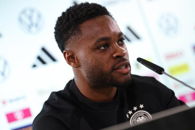 11 November 2025, Lower Saxony, Wolfsburg: Germany's Ridle Baku speaks during the team's press conference ahed of the FIFA World Cup European qualifying soccer matches against Luxembug and Slovakia. Photo: Christian Charisius/dpa