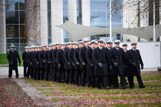 12 November 2025, Berlin: Bundeswehr recruits march between the German Bundestag and the Federal Chancellery during the ceremonial pledge as a central event to mark the 70th anniversary of the German Armed Forces (Bundeswehr) at the Bundesforum. On 12 November 1955, the then Minister of Defense, Blank, presented the first 101 volunteers with their certificates of appointment to mark the founding of the Bundeswehr. Photo: Bernd von Jutrczenka/dpa