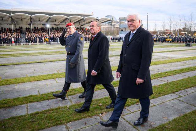 12 November 2025, Berlin: (L-R) Carsten Breuer, Inspector General of the Bundeswehr, Boris Pistorius, German Minister of Defense, and President Frank-Walter Steinmeier walk down the ranks of recruits at the ceremonial swearing-in as a central event to mark the 70th anniversary of the German Armed Forces (Bundeswehr) at the Bundesforum. On 12 November 1955, the then Minister of Defense, Blank, presented the first 101 volunteers with their certificates of appointment to mark the founding of the Bundeswehr. Photo: Bernd von Jutrczenka/dpa