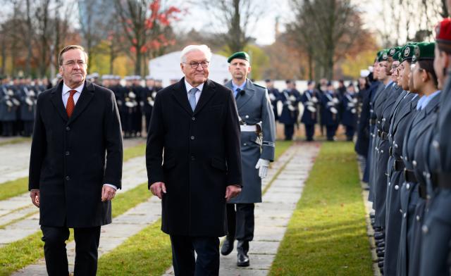 12 November 2025, Berlin: German Minister of Defense Boris Pistorius (L) and President Frank-Walter Steinmeier walk down the ranks of recruits at the ceremonial swearing-in as a central event to mark the 70th anniversary of the German Armed Forces (Bundeswehr) at the Bundesforum. On 12 November 1955, the then Minister of Defense, Blank, presented the first 101 volunteers with their certificates of appointment to mark the founding of the Bundeswehr. Photo: Bernd von Jutrczenka/dpa