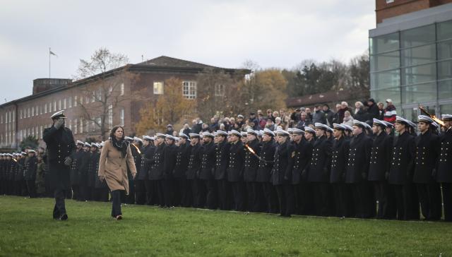 12 November 2025, Schleswig-Holstein, Kiel: Commander of the Naval NCO School Ploen Edgar Behrends (L) and President of the Schleswig-Holstein State Parliament Kristina Herbst walk past the enlisted men and women at the swearing-in ceremony and ceremonial pledge of around 200 soldiers from the Naval NCO School Ploen in front of the Schleswig-Holstein State Parliament. Photo: Christian Charisius/dpa