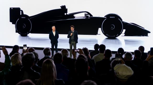 12 November 2025, Bavaria, Munich: Team Principal at car manufacturer Audi Jonathan Wheatley (L) and Formula 1 Project Manager at Audi Mattia Binotto speak during the presentation of Audi's Formula 1 concept car R26 at the Audi Brand Experience Center at Munich Airport. Photo: Daniel Karmann/dpa