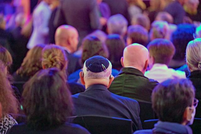 12 November 2025, Bavaria, Munich: A man wearing a kippah sits in the audience at the opening festival of the 39th Jewish Cultural Days Munich organized by the Jewish Community of Munich and Upper Bavaria. Photo: Malin Wunderlich/dpa