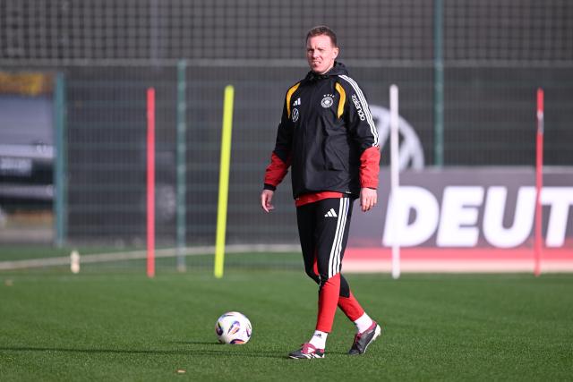 13 November 2025, Lower Saxony, Wolfsburg: Germany coach Julian Nagelsmann watches over a training session ahead of Friday's FIFA World Cup qualifier soccer match against Luxembourg. Photo: David Inderlied/dpa