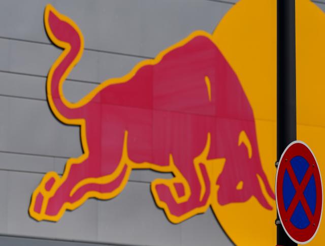 FILED - 27 April 2021, Saxony, Leipzig: A "red bull" can be seen behind a traffic sign outside the training centre of RB Leipzig. The European Commission has opened an anti-trust investigation into Austrian energy drink maker Red Bull over suspicions it may have unlawfully restricted competition. Photo: Peter Endig/dpa-Zentralbild/dpa