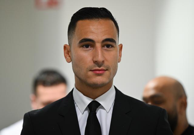 FILED - 19 June 2024, Rheinland-Pfalz, Mainz: Professional footballer Anwar El Ghazi walks in the corridor of the labor court on his way to a hearing.  Winger Anwar El Ghazi has verbally lashed out at his former club Mainz following a legal dispute over his dismissal. Photo: Arne Dedert/dpa