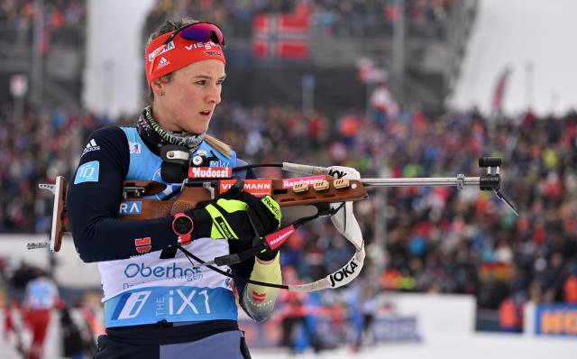 FILED - 12 February 2023, Thuringia, Oberhof: Germany's Denise Herrmann-Wick in action at the shooting range during the women's Pursuit 10 km event of the IBU Biathlon World Championships in Oberhof. Olympic biathlon champion Denise Herrmann-Wick and European steeplechase champion Gesa Krause, both from Germany, have called for a better balance between top-level sport and family lif Photo: Martin Schutt/dpa