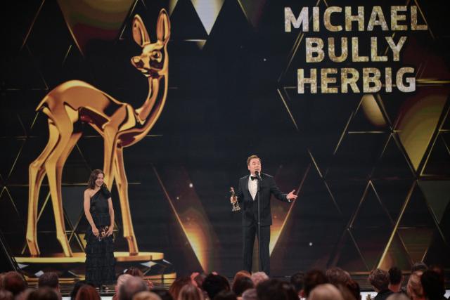 13 November 2025, Bavaria, Gruenwald: German actor Michael Bully Herbig receives an "Honorary Award of the BAMBI Jury 2025" during the 77th Bambi Award Ceremony at the Bavaria Film Studios. Photo: Peter Kneffel/dpa