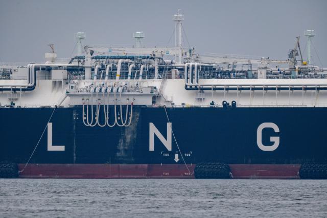 FILED - 17 September 2024, Mecklenburg-Western Pomerania, Sassnitz-Mukran: The regasification ships (FSRU, Floating Storage and Regasification Unit) "Energos Power" (foreground) and "Neptune" are moored in the port of Mukran. Photo: Stefan Sauer/dpa