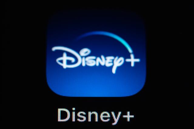 FILED - 08 March 2022, Baden-Wuerttemberg, Rottweil: The application App Disney+ can be seen on the display of an iPhone SE. Photo: Silas Stein/dpa