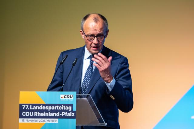 15 November 2025, Rhineland-Palatinate, Morbach: German Chancellor Friedrich Merz speaks at the Rhineland-Palatinate Christian Democratic Union of Germany (CDU) state party conference. Among other things, the delegates elected the list of candidates for the 2026 state elections. Photo: Harald Tittel/dpa