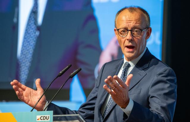 15 November 2025, Rhineland-Palatinate, Morbach: German Chancellor Friedrich Merz speaks at the Rhineland-Palatinate Christian Democratic Union of Germany (CDU) state party conference. Among other things, the delegates elected the list of candidates for the 2026 state elections. Photo: Harald Tittel/dpa