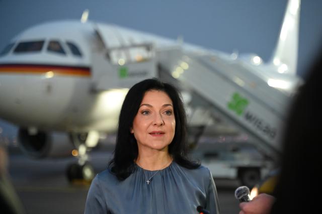 16 November 2025, Brandenburg, Schoenefeld: Katherina Reiche, German Minister for Economic Affairs and Energy, gives a press statment ahead of her departure to the United Arab Emirates. Reiche is traveling to the United Arab Emirates and Qatar. Photo: Katharina Kausche/dpa