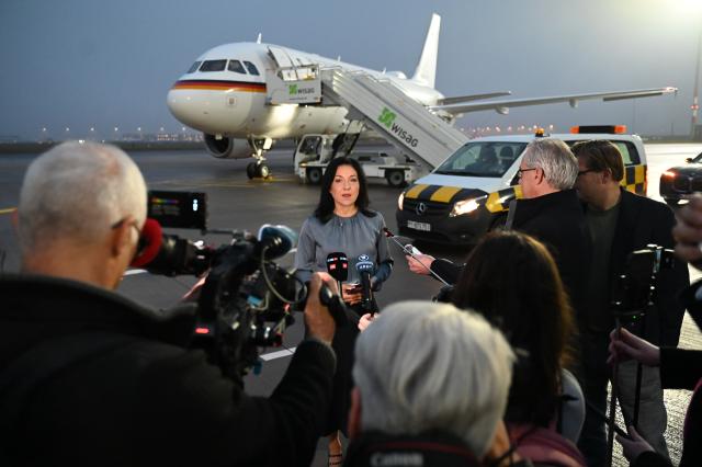 16 November 2025, Brandenburg, Schoenefeld: Katherina Reiche, German Minister for Economic Affairs and Energy, gives a press statment ahead of her departure to the United Arab Emirates. Reiche is traveling to the United Arab Emirates and Qatar. Photo: Katharina Kausche/dpa