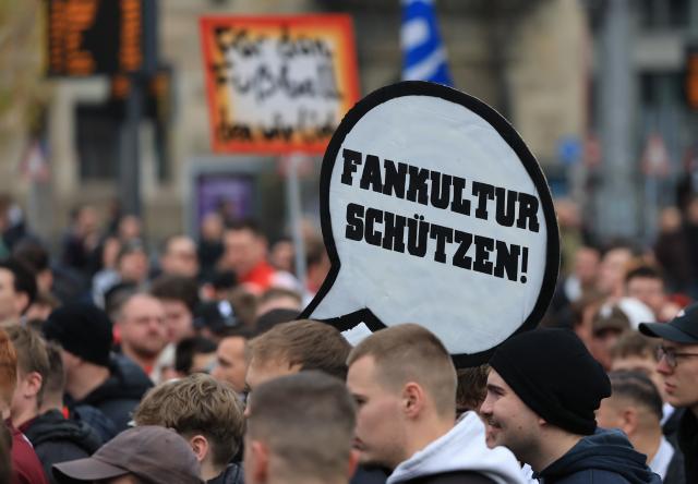 16 November 2025, Saxony, Leipzig: Soccer fans from all over Germany protest together in Leipzig city center against stricter security measures at soccer matches. The demonstration comes in response to the interior ministers' plans to tighten precautions in stadiums. Photo: Jan Woitas/dpa