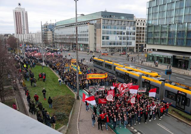 16 November 2025, Saxony, Leipzig: Soccer fans from all over Germany protest together in Leipzig city center against stricter security measures at soccer matches. The demonstration comes in response to the interior ministers' plans to tighten precautions in stadiums. Photo: Jan Woitas/dpa