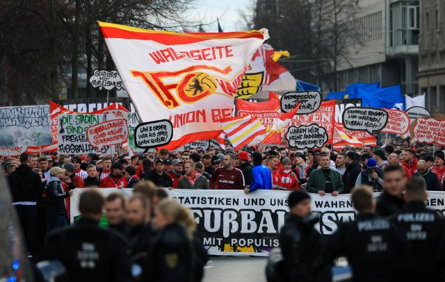16 November 2025, Saxony, Leipzig: Soccer fans from all over Germany protest together in Leipzig city center against stricter security measures at soccer matches. The demonstration comes in response to the interior ministers' plans to tighten precautions in stadiums. Photo: Jan Woitas/dpa