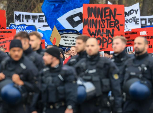 16 November 2025, Saxony, Leipzig: Soccer fans from all over Germany protest together in Leipzig city center against stricter security measures at soccer matches. The demonstration comes in response to the interior ministers' plans to tighten precautions in stadiums. Photo: Jan Woitas/dpa