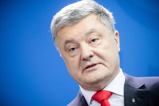 FILED - 12 April 2019, Berlin: Petro Poroshenko, Then Ukrainian president, speaks during a press conference in Berlin. Former Ukrainian president Petro Poroshenko called on Monday for the entire cabinet to resign over the corruption scandal currently shaking the country as it fights off a Russian invasion. Photo: Michael Kappeler/dpa