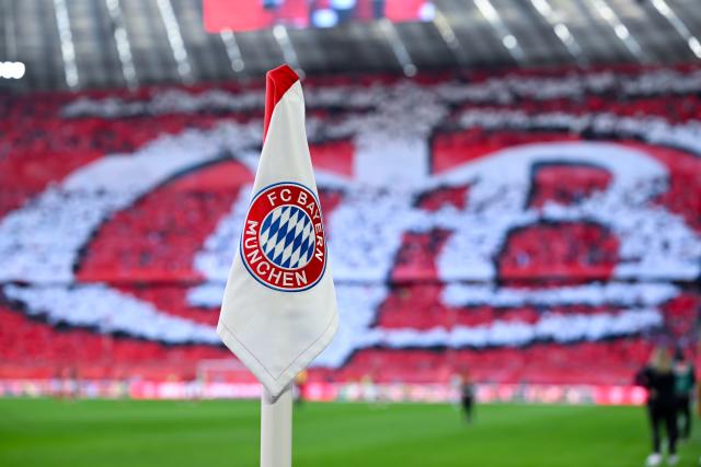 FILED - 08 March 2025, Bavaria, Munich: A corner flag stands in front of a choreo by the Bayern fans before the German Bundesliga soccer match between Bayern Munich and VfL Bochum at the Allianz Arena. Photo: Sven Hoppe/dpa - IMPORTANT NOTE: In accordance with the regulations of the DFL German Football League and the DFB German Football Association, it is prohibited to utilize or have utilized photographs taken in the stadium and/or of the match in the form of sequential images and/or video-like photo series.