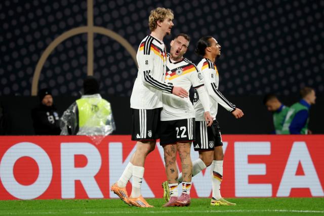 17 November 2025, Saxony, Leipzig: Germany's Nick Woltemade celebrates after scoring his side's first goal of the game during the FIFA World Cup European qualifying match between Germany and Slovakia at Red Bull Arena. Photo: Christian Charisius/dpa