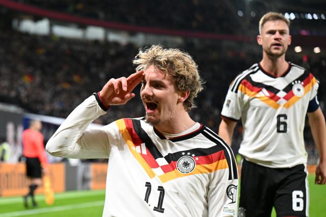 17 November 2025, Saxony, Leipzig: Germany's Nick Woltemade celebrates after scoring his side's first goal of the game during the FIFA World Cup European qualifying match between Germany and Slovakia at Red Bull Arena. Photo: Robert Michael/dpa