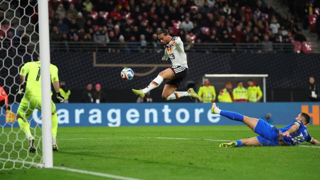 17 November 2025, Saxony, Leipzig: Germany's Leroy Sane (C) scores his side's fourth goal of the game during the FIFA World Cup European qualifying soccer match between Germany and Slovakia at Red Bull Arena. Photo: Christian Charisius/dpa