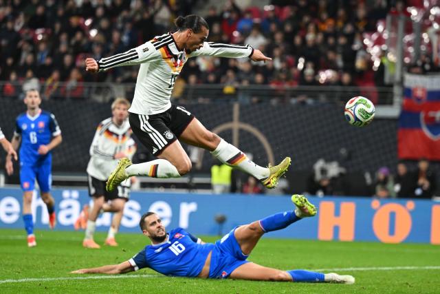 17 November 2025, Saxony, Leipzig: Germany's Leroy Sane scores his side's fourth goal of the game during the FIFA World Cup European qualifying match between Germany and Slovakia at Red Bull Arena. Photo: Robert Michael/dpa