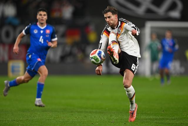 17 November 2025, Saxony, Leipzig: Germany's Leon Goretzka stops the ball during the FIFA World Cup European qualifying match between Germany and Slovakia at Red Bull Arena. Photo: Robert Michael/dpa