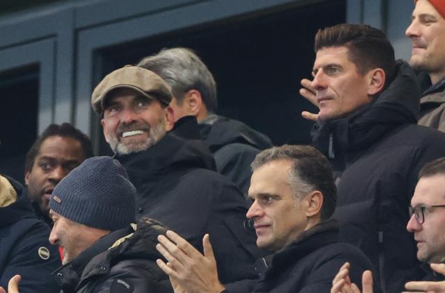 17 November 2025, Saxony, Leipzig: Juergen Klopp (2nd L), Red Bull Global Sports Director, and Mario Gomez (2nd R), Technical Director at Red Bull, watch the FIFA World Cup European qualifying match between Germany and Slovakia at Red Bull Arena. Photo: Jan Woitas/dpa