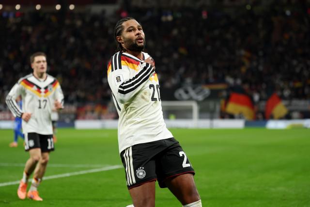17 November 2025, Saxony, Leipzig: Germany's Serge Gnabry (Front) celebrates after scoring his side's second goal of the game during the FIFA World Cup European qualifying match between Germany and Slovakia at Red Bull Arena. Photo: Christian Charisius/dpa