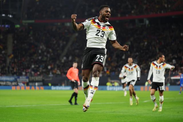 17 November 2025, Saxony, Leipzig: Germany's Ridle Baku celebrates after scoring his side fifth goal of the game during the FIFA World Cup European qualifying match between Germany and Slovakia at Red Bull Arena. Photo: Christian Charisius/dpa