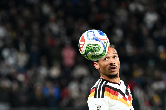 17 November 2025, Saxony, Leipzig: Germany's Leroy Sane looks towards the ball during the FIFA World Cup European qualifying match between Germany and Slovakia at Red Bull Arena. Photo: Robert Michael/dpa