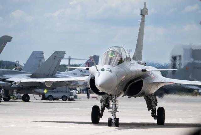 FILED - 06 June 2024, Rhineland-Palatinate, Ramstein: A Dassault Rafale C fighter jet takes off from the US airbase in Ramstein as part of a large-scale exercise involving numerous fighter jets from several NATO countries. Photo: Boris Roessler/dpa