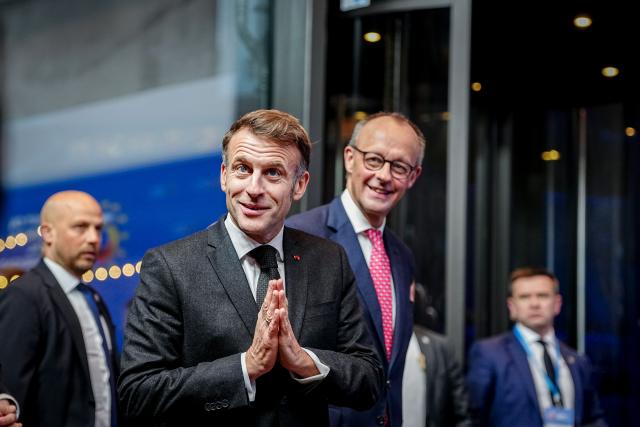 18 November 2025, Berlin: French President Emmanuel Macron (front left) and German Chancellor Friedrich Merz gather for a photo at the European Digital Sovereignty Summit at the Euref Campus. The summit takes place at the invitation of the German and French digital ministries. Photo: Kay Nietfeld/dpa