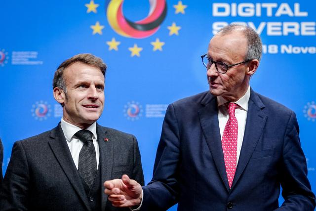 18 November 2025, Berlin: French President Emmanuel Macron (L) and German Chancellor Friedrich Merz take part in the European Digital Sovereignty Summit at the Euref Campus. The summit takes place at the invitation of the German and French digital ministries. Photo: Kay Nietfeld/dpa