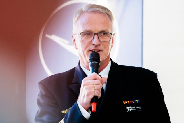18 November 2025, Berlin: Broder Nielsen, Commander of the Naval Aviation Command, speaks at the launch of pilot training for the German Navy's P-8A "Poseidon" by Lufthansa Aviation Training. Photo: Carsten Koall/dpa