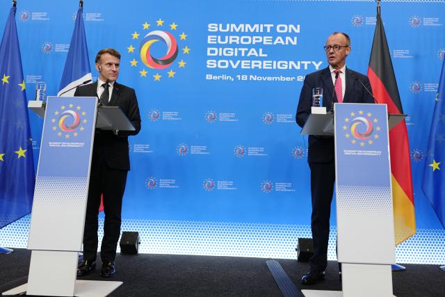 18 November 2025, Berlin: French President Emmanuel Macron (L) and German Chancellor Friedrich Merz give a press conference at the European Digital Sovereignty Summit at the Euref Campus. The summit takes place at the invitation of the German and French digital ministries. Photo: Kay Nietfeld/dpa