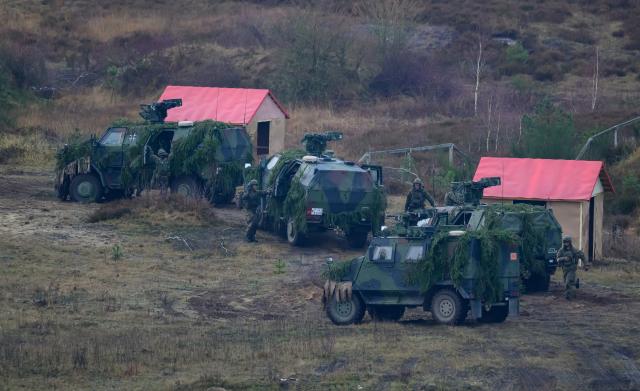 FILED - 04 December 2024, Lower Saxony, Bergen: European soldiers take part in the MILEX24 military exercise. The European Commission will on Wednesday propose an emergency system to speed up the cross-border movement of troops and military equipment in response to growing security threats from Russia, according to information obtained by dpa. Photo: Philipp Schulze/dpa