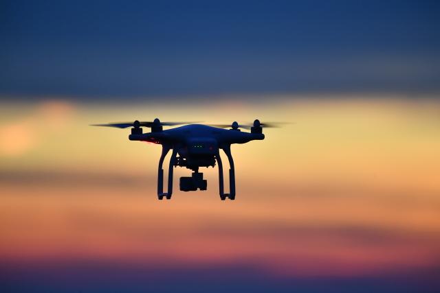 FILED - 02 February 2017, Markdorf: A drone flies over a meadow at sunset. Bundeswehr could be allowed to assist domestic security agencies protect against drone incursions under a draft law the government in Berlin is set to discuss on Wednesday, according to documents obtained by dpa. Photo: Felix Kästle/dpa