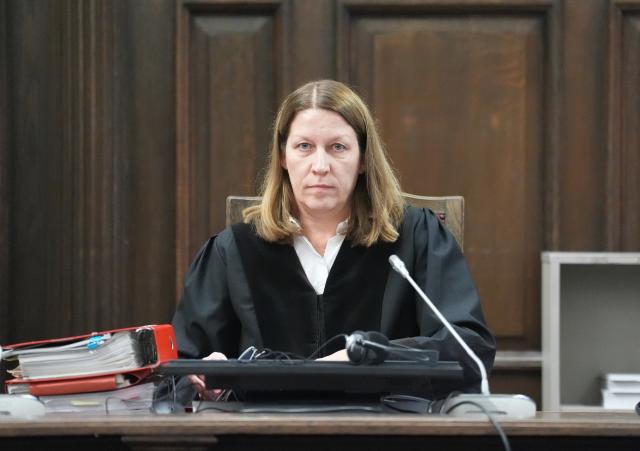 19 November 2025, Hamburg: Chairwoman of the criminal chamber Isabel Hildebrandt sits in a courtroom at the regional court before the start of the trial against C. Block for alleged child abduction. Photo: Marcus Brandt/dpa-Pool/dpa