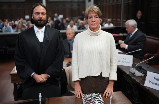 19 November 2025, Hamburg: German restaurateur and entrepreneur Christina Block and one of C. Block's two defense lawyers Ingo Bott stand in a courtroom at the regional court before the start of the trial against C. Block for alleged child abduction. Photo: Marcus Brandt/dpa-Pool/dpa