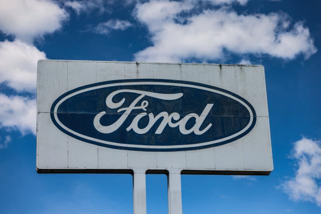 FILED - 09 May 2025, North Rhine-Westphalia, Cologne: Ford Logo is seen in front of the company's plant in Cologne. Photo: Oliver Berg/dpa