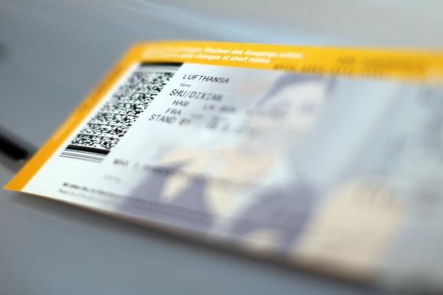 FILED - 07 September 2012, Hamburg: A flight ticket is seen on a table in Hamburg. A recent opinion poll showed a division among Germans regarding reducing the tax on airline tickets. Photo: Malte Christians/dpa/dpa-tmn