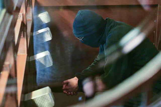 20 November 2025, Berlin: The defendant Wassim Al M. sits in the courtroom of the Moabit Criminal Court at the start of the trial. The Syrian refugee allegedly stabbed a visitor from behind with a knife in the field of stelae at the Holocaust memorial on February 21. Photo: Sebastian Christoph Gollnow/dpa