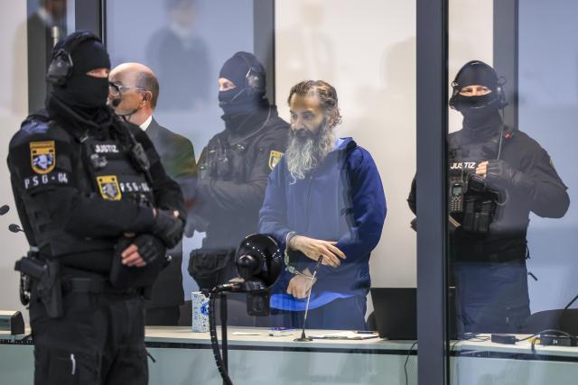 20 November 2025, Saxony-Anhalt, Magdeburg: Defendant Taleb al-Abdulmohsen sits in a bulletproof glass box at Magdeburg District Court during the trial. The public prosecutor's office is accusing the man from Saudi Arabia of 338 counts of attempted murder. On December 20, 2024, Taleb al-Abdulmohsen drove into a crowd of people at Magdeburg's Christmas market, killing 6 and injuring more than 300 people. Photo: Jan Woitas/dpa