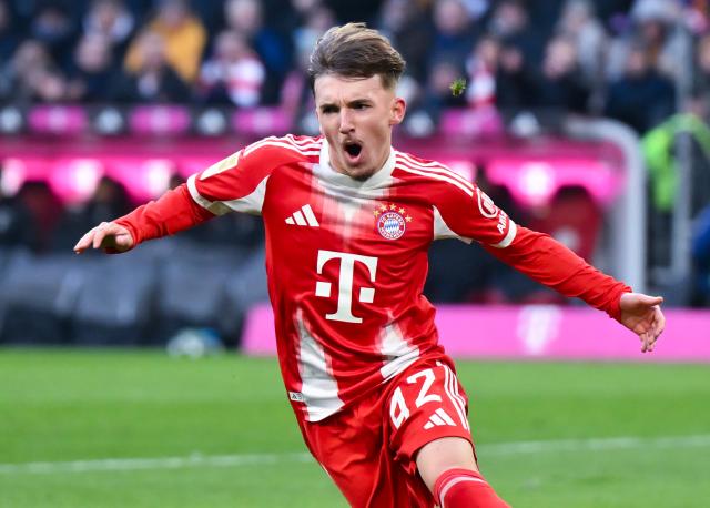 22 November 2025, Bavaria, Munich: Bayern Munich's Lennart Karl celebrates scoring his side's first goal during the German Bundesliga soccer match between Bayern Munich and SC Freiburg at the Allianz Arena. Photo: Sven Hoppe/dpa - IMPORTANT NOTICE: DFL and DFB regulations prohibit any use of photographs as image sequences and/or quasi-video.