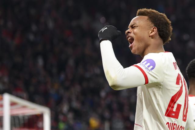 23 November 2025, Saxony, Leipzig: Leipzig's Assan Ouedraogo celebrates scoring his side's first goal during the German Bundesliga soccer match between RB Leipzig and Werder Bremen at Red Bull Arena. Photo: Jan Woitas/dpa - WICHTIGER HINWEIS: Gemäß den Vorgaben der DFL Deutsche Fußball Liga bzw. des DFB Deutscher Fußball-Bund ist es untersagt, in dem Stadion und/oder vom Spiel angefertigte Fotoaufnahmen in Form von Sequenzbildern und/oder videoähnlichen Fotostrecken zu verwerten bzw. verwerten zu lassen.
